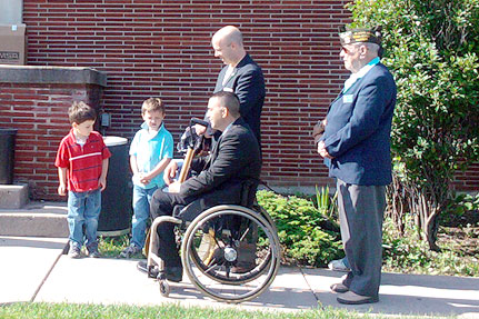 people standing around VFW building